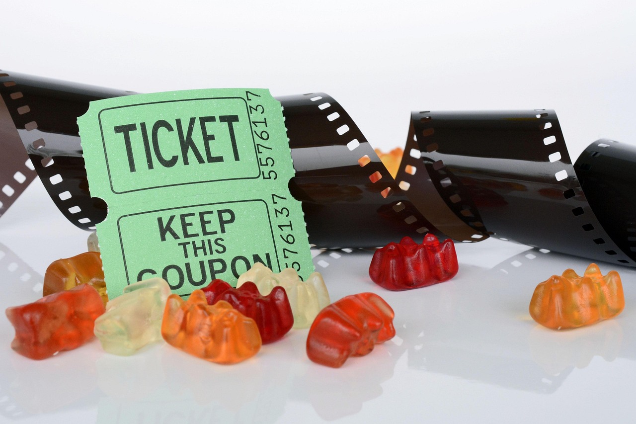 film roll, ticket, gummy bear, movie, movie theater, recording, filmstrip, demonstration, coupon, cinema strip, entertainment, film screening, entry, inlet, green, food red, orange, ticket, ticket, ticket, ticket, ticket, coupon